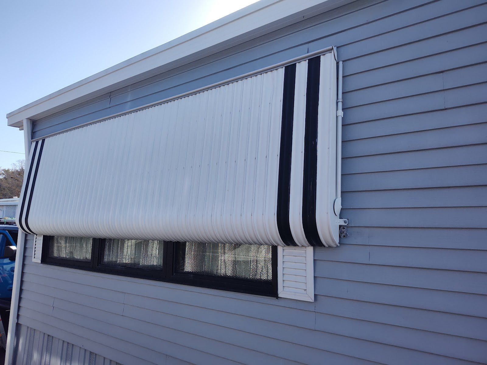 Window awning on a manufactured home