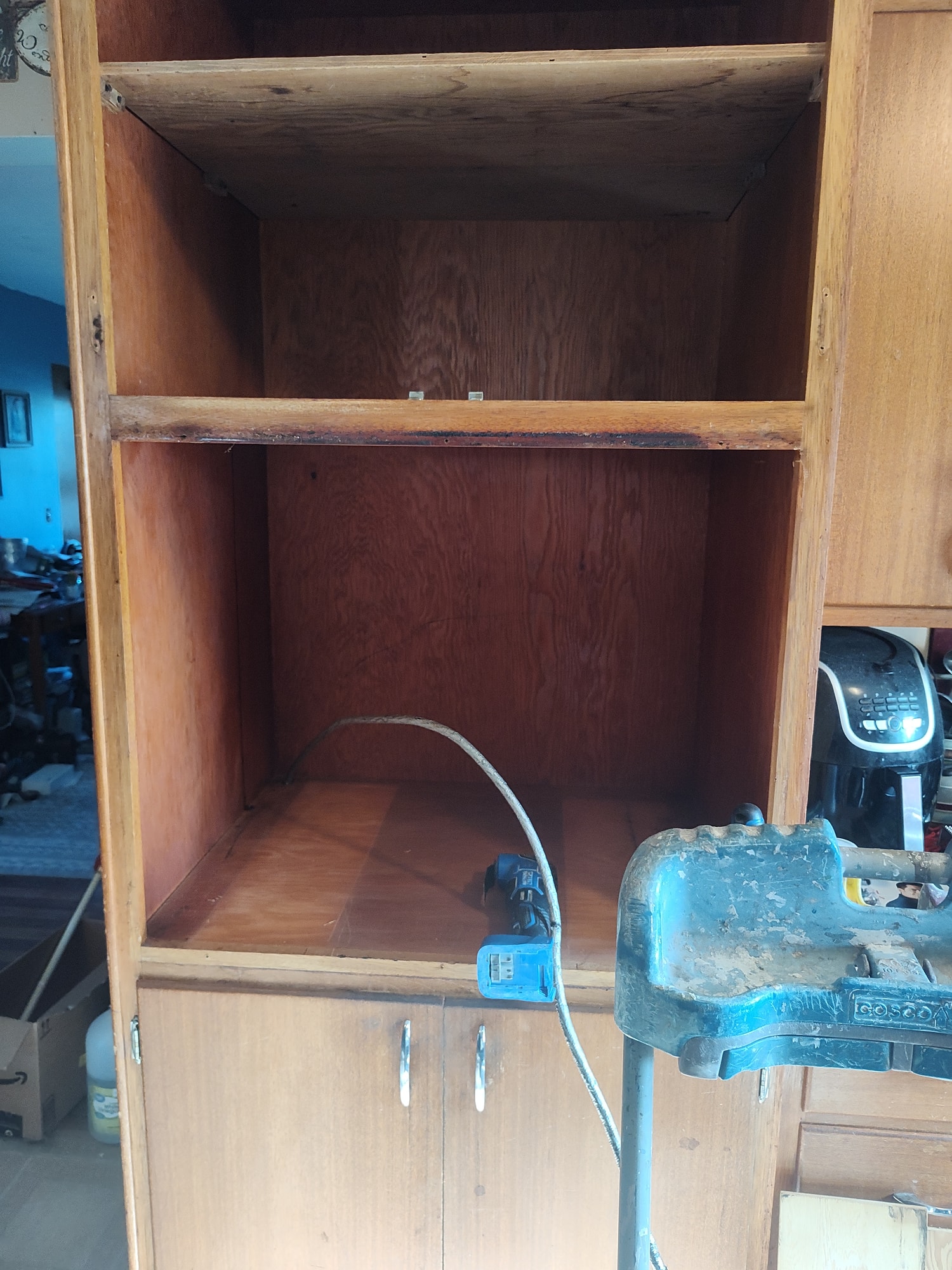 The empty cabinet cavity before the wall oven install